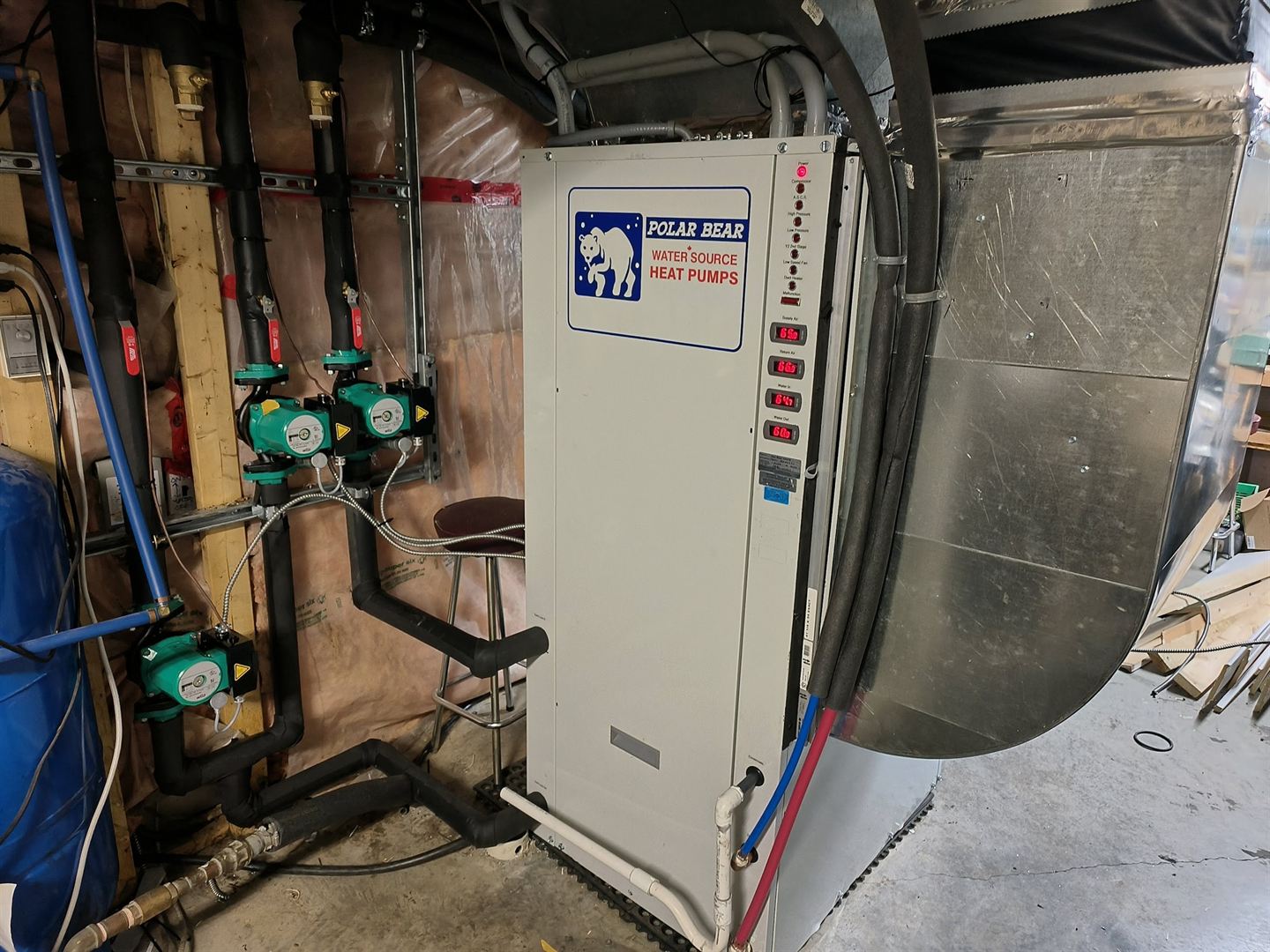 Heat pump in a residential basement.
